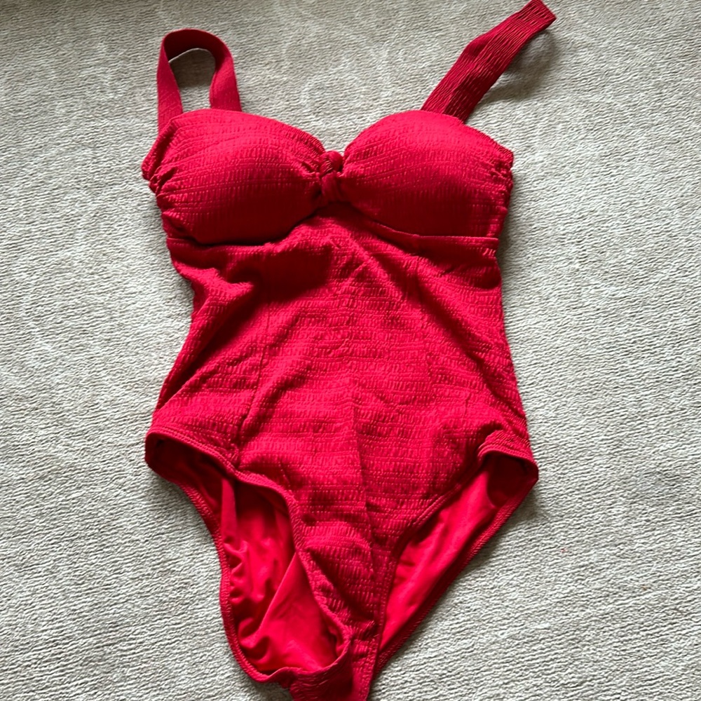 Maternity one-piece swimsuit. Open back with gold claps. Light padding. Red